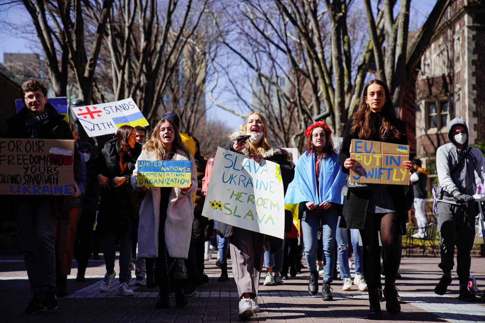 Less than a week after Russian forces invaded Ukraine, Penn students walked in solidarity across campus to show solidarity between the University community and Ukraine. A poster reads "Slava Ukraine Heroem Slava" among other phrases. Photo Courtesy The Daily Pennsylvanian